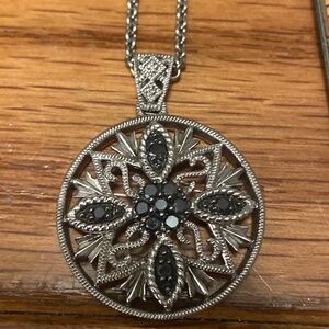 Sterling Silver circle pendant with sterling silver chain.